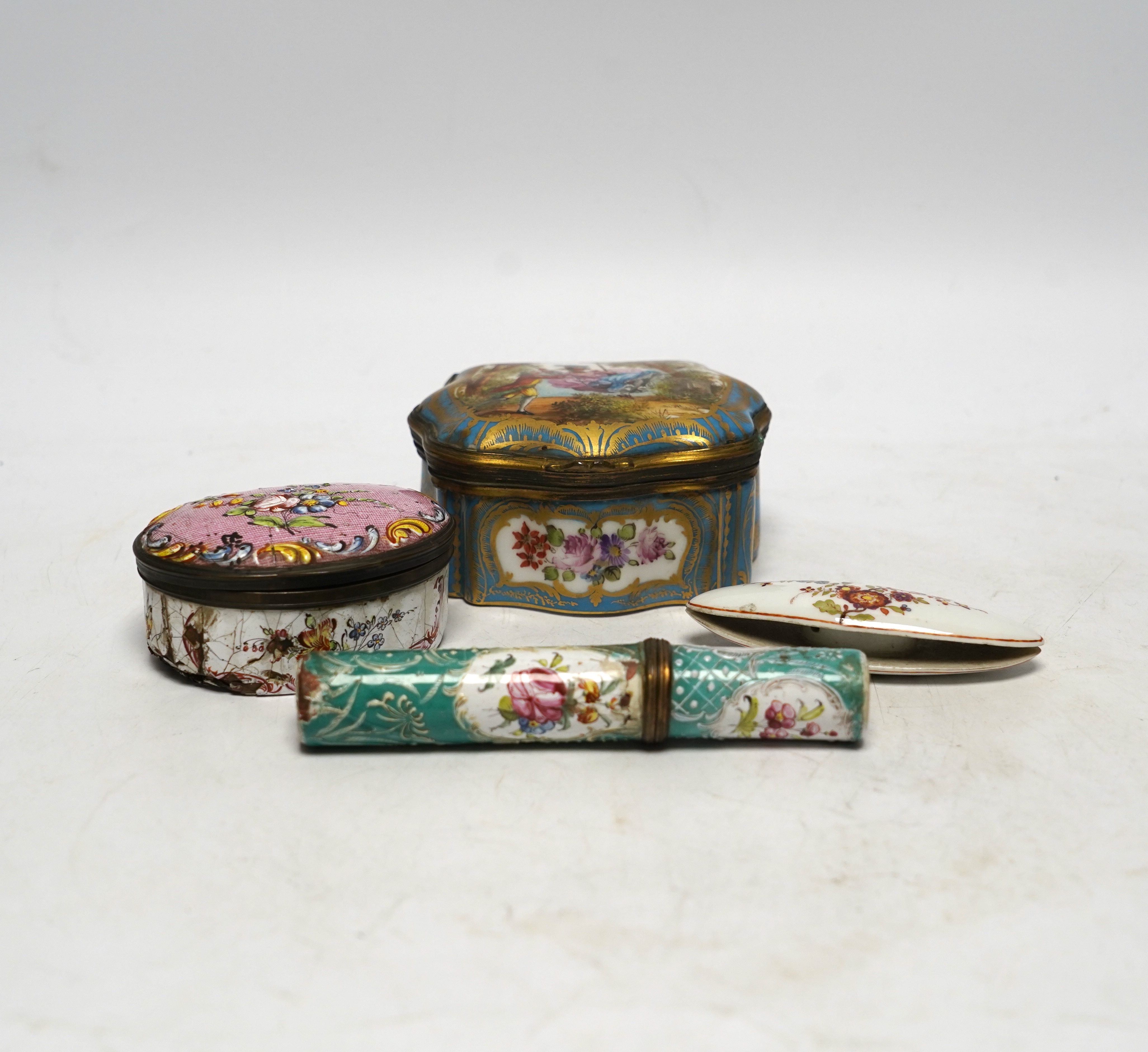 A South Staffordshire enamel bodkin case, 9cm wide, and three other enamel items; a patch box, thread holder and box with hinged cover.